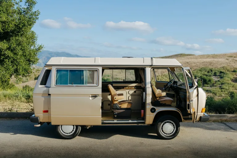 a van is parked on the side of the road